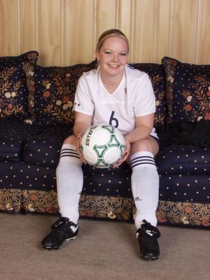 Jessica se déshabillant d'un uniforme de football
